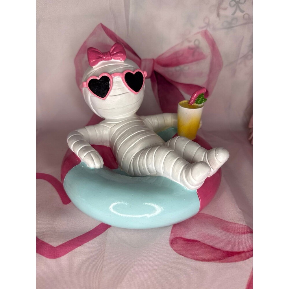 SummerWeen/Halloween Mummy on Pool Float with a Cocktail